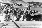 Inhabitants of Cephalonia awaiting evacuation on the Sea front, August 1953. Image from Imperial War Museums, A32643