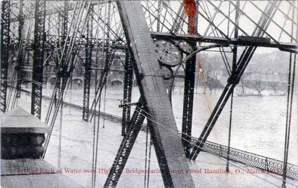 Rush of water over high Street Bridge, Hamilton, Ohio