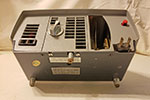Technicolor Instant Movie Projector 800 Deluxe. Showing the auxiliary output and the self-winding cord storage.