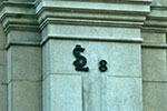 St. Leonard's 18 marker, 37/39 Corn Street. The marker was put onto a new building but now the '1' is missing