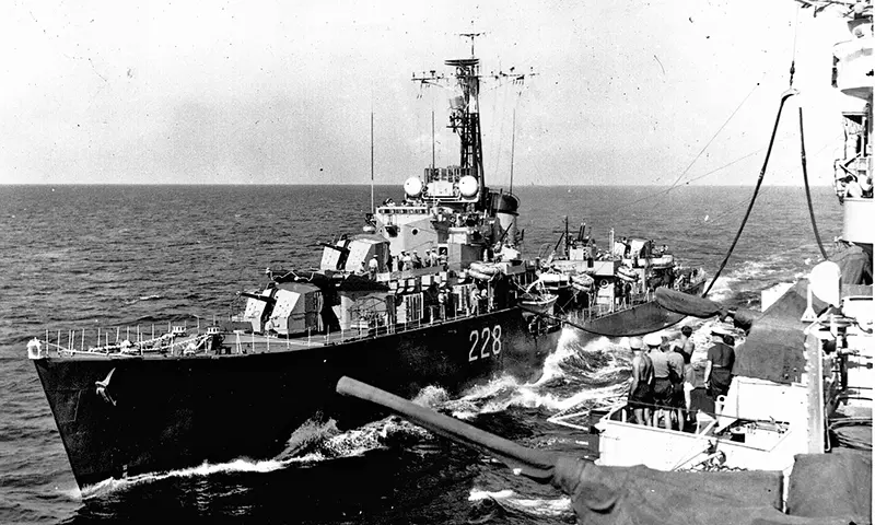 Fueling HMCS Crusader from HMS Warrior - 1953