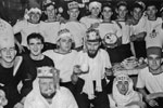 Christmas Day, 1950. This is 28 & 30 Seaman's Mess, all Radar men. John Harris, who very kindly sent me information about the collision with HMS Phoebe and the only person who's name I know in this photo is in the tall hat on the right, next to "Gur" the Arab. Photo from my dad's albums.