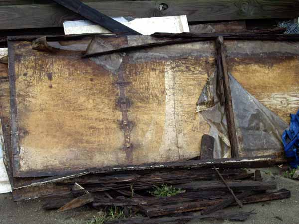 The old, rotten pool siding