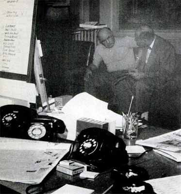 Treasury man interviewing one of the telephone operators